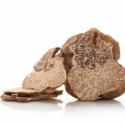 White truffle cross section and slices isolated on white background.